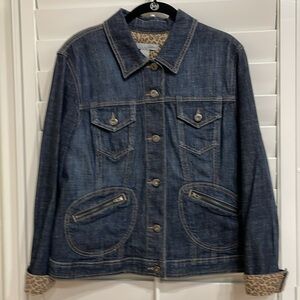 Chico’s Platinum Blue Denim Jacket with cuffs lined with Cheetah Print. Size 2